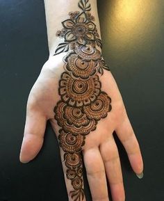 22. Bold roses design in Arabic Mehndi for brides