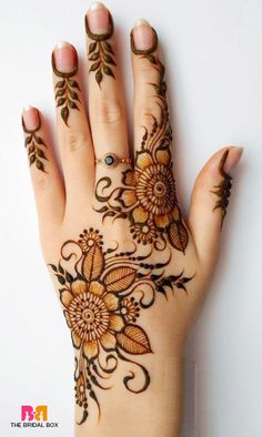 41. Symmetrical shaded-flower design in Arabic Mehndi for brides