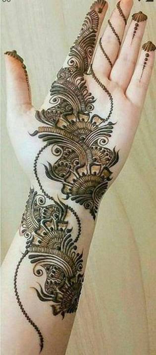 45. Flower and Paisley trail design with dotted patterns in Arabic Mehndi for brides