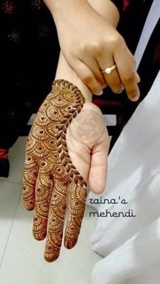 9. Half hand design in Arabic Mehndi for brides