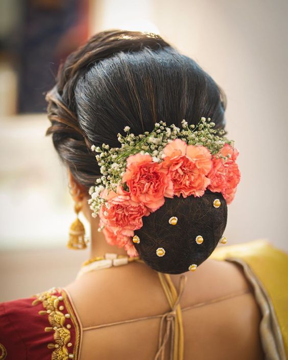 30 Best Floral Bridal Bun Hairstyles For This Wedding Season  Wedbook