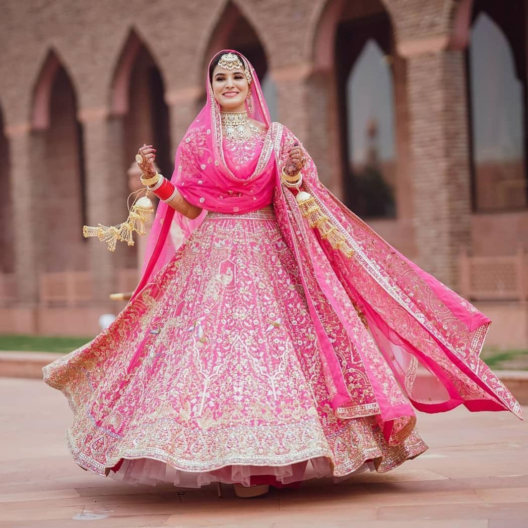 Punjabi bride standing Stock Photo - Alamy